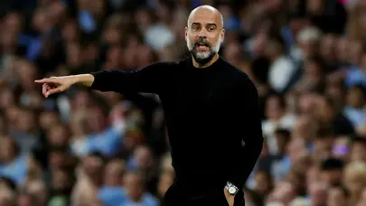 Pep Guardiola, futbolcusuna kullandığı kelime için canlı yayında defalarca kez özür diledi