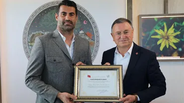 Volkan Demirel'e "fahri hemşehrilik" beratı