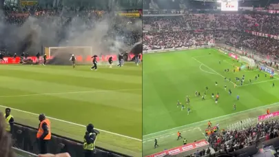 Fransa Ligue 1 yangın yeri! Tribünler sahaya indi, Trabzonspor'un eski hocası taraftarla kavga etti Fransa Ligue 1 yangın yeri! Tribünler sahaya indi, Trabzonspor'un eski hocası taraftarla kavga etti